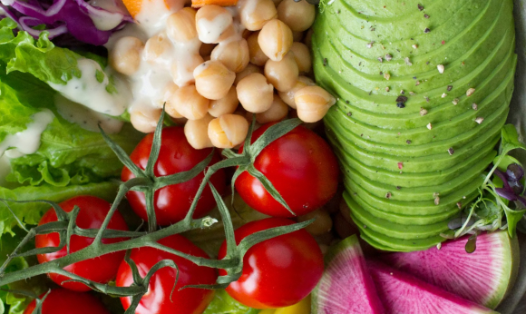 Top view, flat lay of healthy vegan salad bowl
